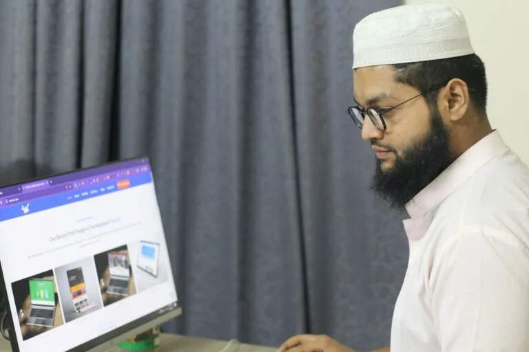 A website developer working on his computer for website development company